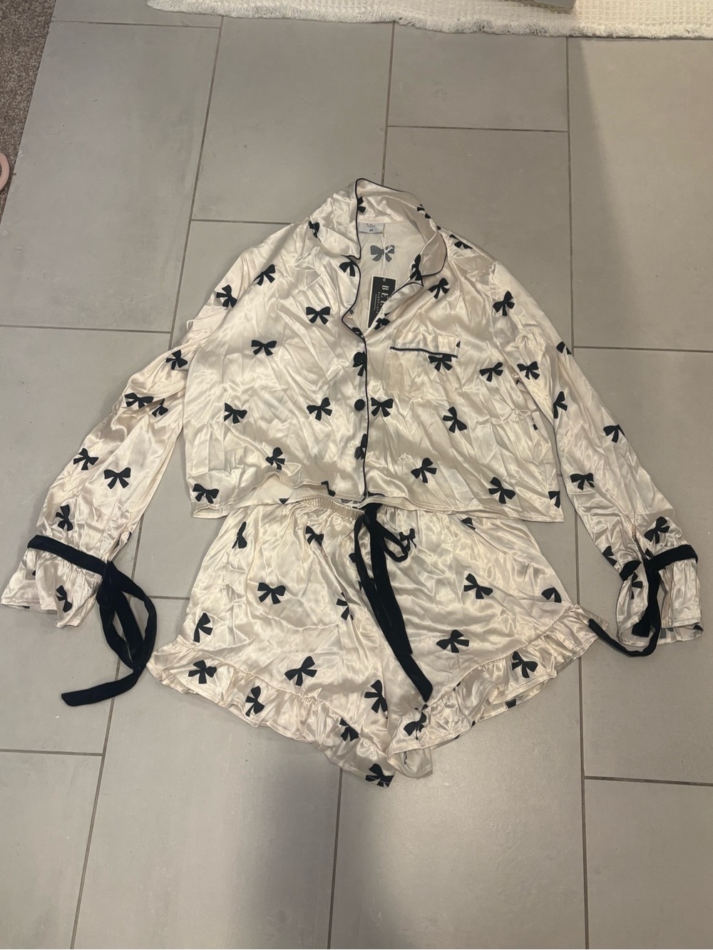 Silky Ivory Women’s Pajama Shirt with Black Bow Print